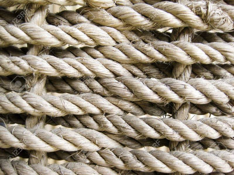 10445615-close-up-of-interwoven-rough-textured-rattan-ropes